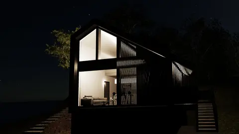 Night rendering of a gabled addition glowing through vertical timber slats