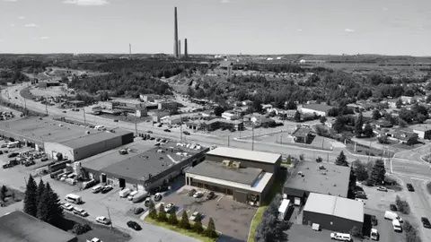 Aerial view of the street and surrounding commercial buildings